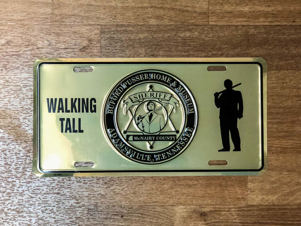 Silhouette Walking Tall License Plate